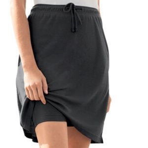 Woman Within Gray Skort